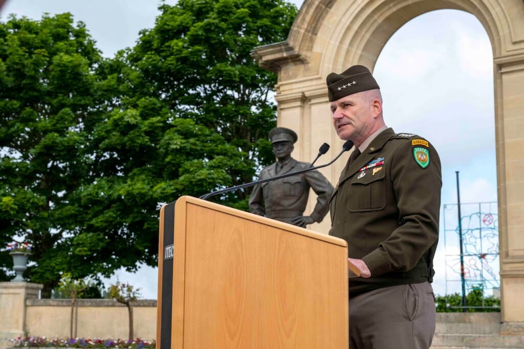 Army Gen. Christopher Cavoli, supreme allied commander Europe, speaks at the D-Day ceremony honoring World War II hero Army