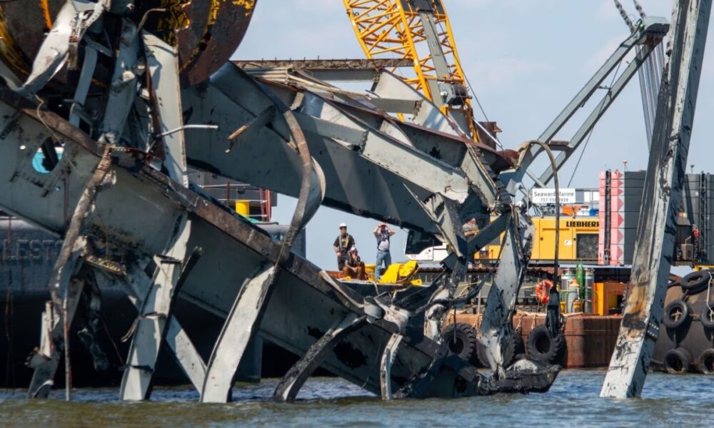 Salvors use a heavy lift sheerleg crane ship, the Chesapeake 1000, to remove wreckage from the Francis Scott Key Bridge collapse, Baltimore Harbor, Md., April 29, 2024.