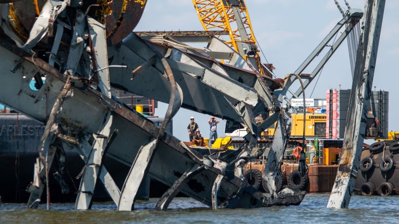 Salvors use a heavy lift sheerleg crane ship, the Chesapeake 1000, to remove wreckage from the Francis Scott Key Bridge collapse, Baltimore Harbor, Md., April 29, 2024.