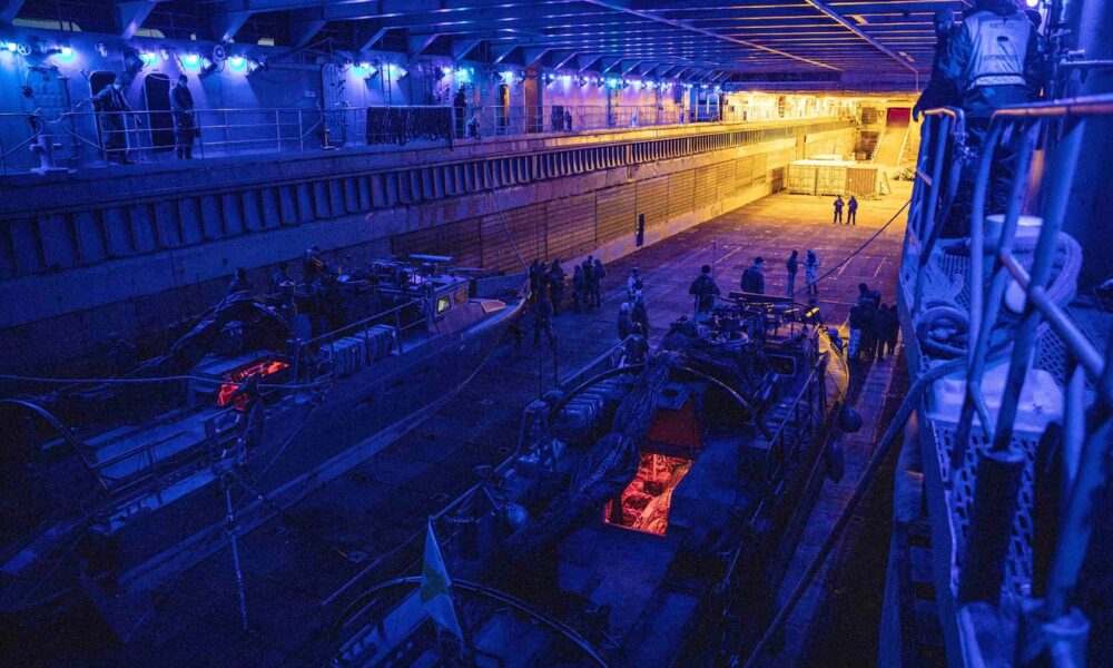 Swedish marines prepare fast assault crafts for small boat operations in the well deck of the dock landing ship USS Gunston Hall during Steadfast