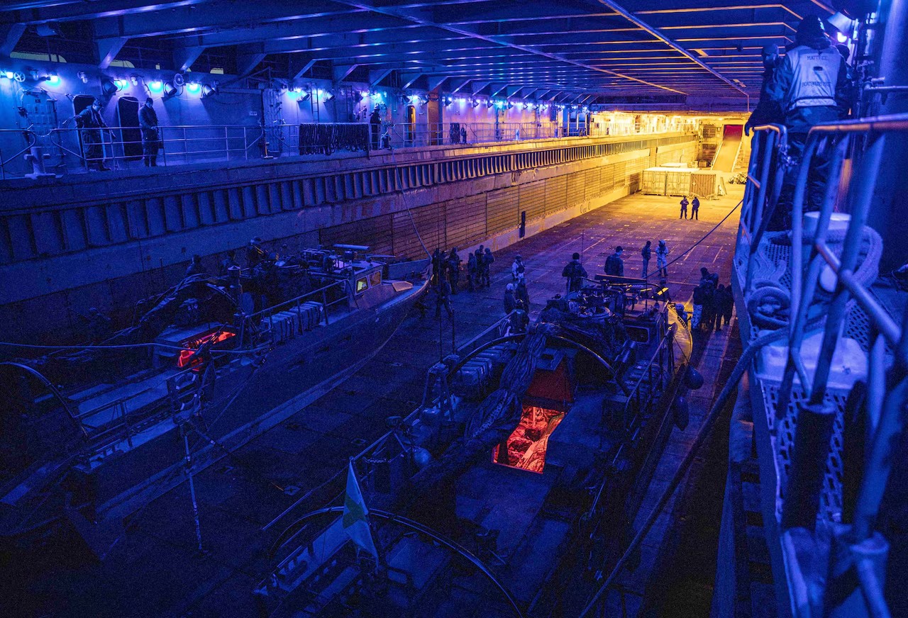 Swedish marines prepare fast assault crafts for small boat operations in the well deck of the dock landing ship USS Gunston Hall during Steadfast