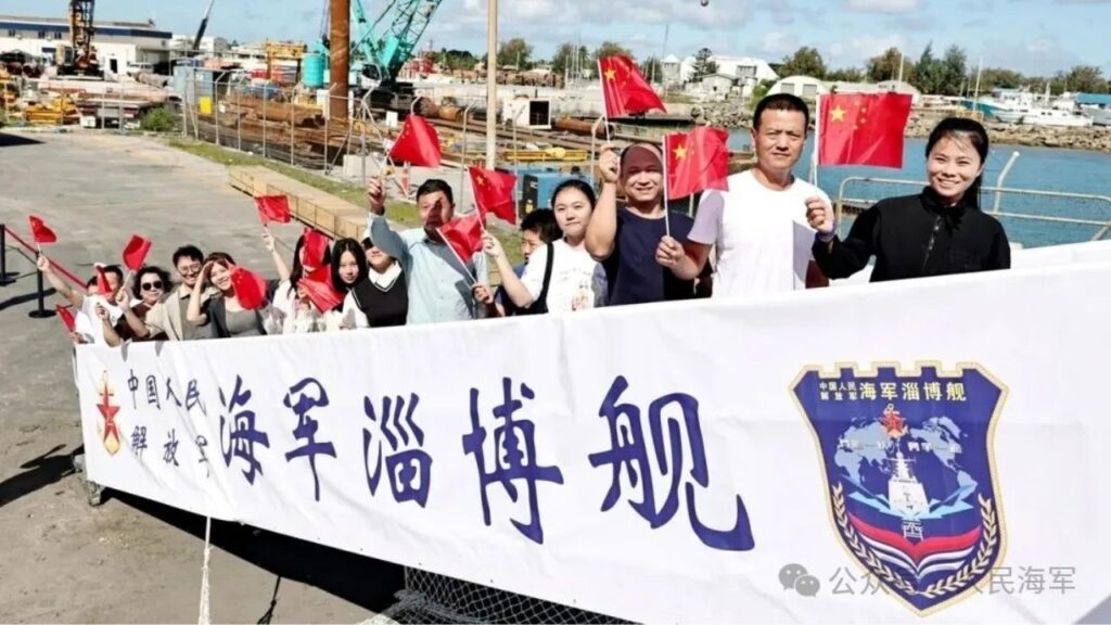 The welcoming crowd boards the Chinese naval ship Zibo for visits during the ship open-day activity