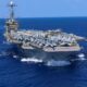 The Nimitz-class aircraft carrier USS Harry S. Truman (CVN 75), conducts a vertical replenishment-at-sea, Aug. 16.