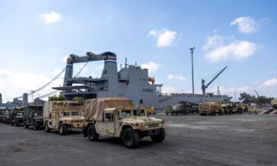 Military vehicles are staged near Military Sealift Command chartered ship MV Cape Hudson (T-AKR 5066) during an offload of equipment in support of exercise Super Garuda Shield 2024, at the Port of Banyuwangi, Indonesia Aug. 12. Super Garuda Shield, one of the largest multinational exercises in the Indo-Pacific region, continues to solidify the U.S.-Indonesia Major Defense Partnership Defense Cooperation Agreement and advances cooperation in support of a free and open Indo-Pacific region. (Navy photo by Grady T. Fontana)