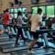 Gym goers run on new treadmills at the JBPHH Fitness Center.