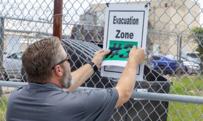 Evacuation Signage and Black Flags Help Protect Norfolk Naval Shipyard Workforce