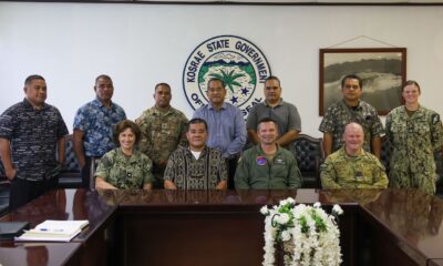 Pacific Partnership 2024-2 (PP24-2) service members take a group photo with government officials in Kosrae, Federated States of Micronesia.