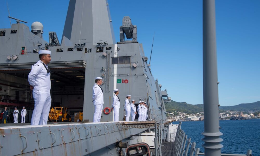 Sailors man the rails aboard USS San Diego (LPD 22) as it arrives at Fleet Activities Sasebo.