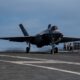 An F-35C Lightning II from the VFA-86 performs a touch and go aboard USS Nimitz (CVN 68).