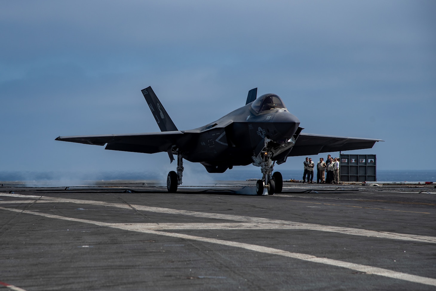 An F-35C Lightning II from the VFA-86 performs a touch and go aboard USS Nimitz (CVN 68).