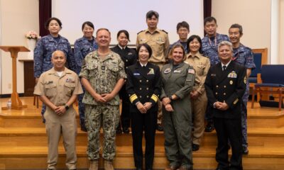 Participants of the 2024 Sasebo Women’s Leadership Symposium pose for a group photo at Commander, Fleet Activities Sasebo.