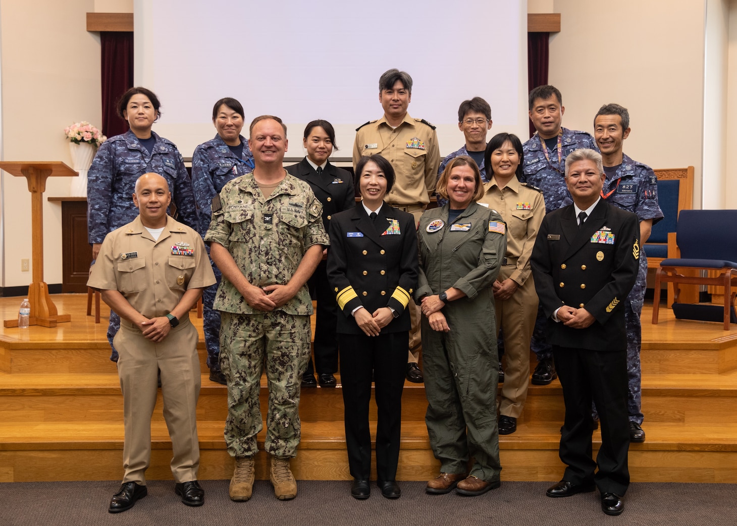 Participants of the 2024 Sasebo Women’s Leadership Symposium pose for a group photo at Commander, Fleet Activities Sasebo.