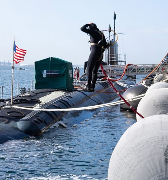 Three NUWC Division Newport engineering agents perform first modernizations to submarine in Australia