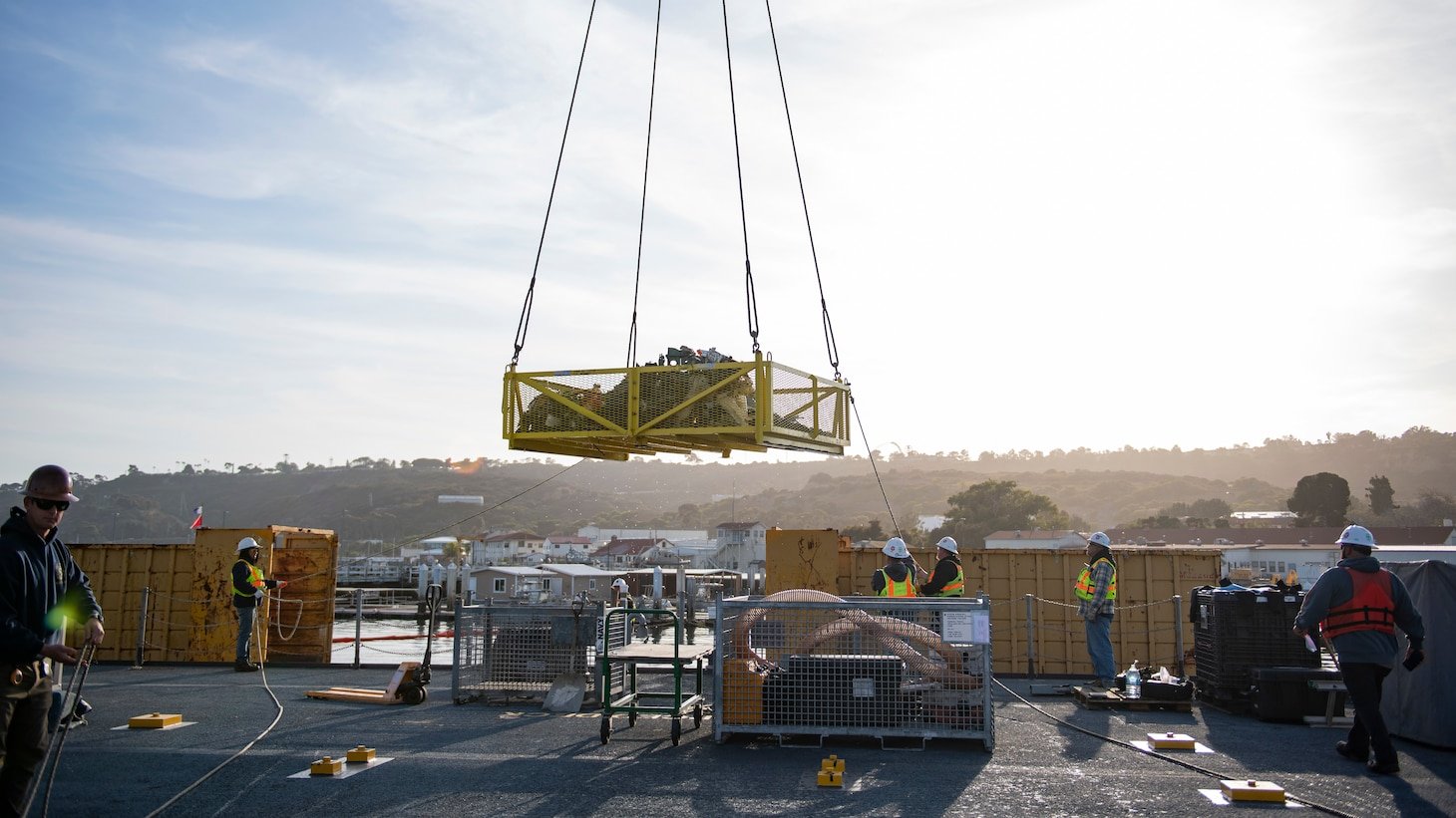 Members of Mobile Diving and Salvage Company 3-8 and contractors conduct salvage operations for an EA-18G Growler in San Diego Bay, Feb. 18, 2025.