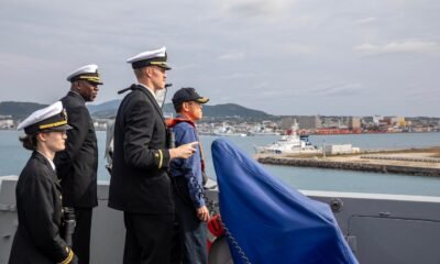 The Commanding Officer of the San Antonio-class amphibious transport dock ship USS San Diego (LPD 22), Capt. Timothy Carter (back left), stands alongside the Ishigaki harbor pilot and his bridge watch team as the ship arrives in Ishigaki, Japan, Feb. 26.