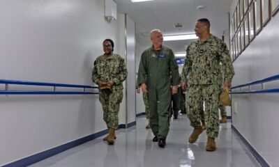 U.S. Naval Hospital (USNH) Yokosuka Executive Officer, Capt. Richard Gillard discusses the capabilities of the hospital with Commander, Naval Air Forces Vice Adm. Daniel Cheever during a tour of USNH Yokosuka.