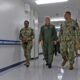 U.S. Naval Hospital (USNH) Yokosuka Executive Officer, Capt. Richard Gillard discusses the capabilities of the hospital with Commander, Naval Air Forces Vice Adm. Daniel Cheever during a tour of USNH Yokosuka.