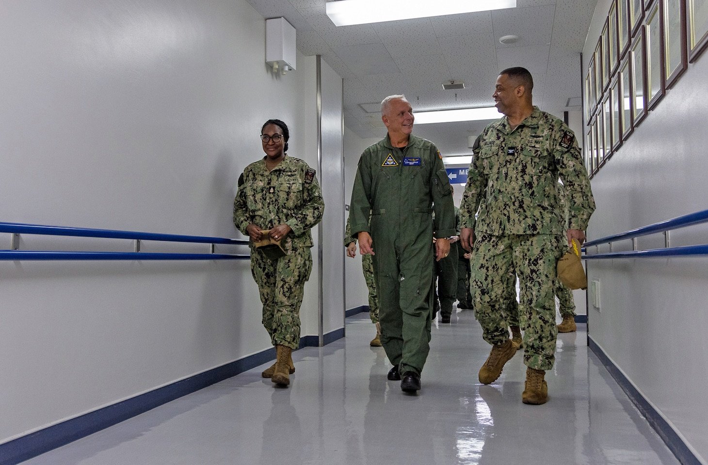 U.S. Naval Hospital (USNH) Yokosuka Executive Officer, Capt. Richard Gillard discusses the capabilities of the hospital with Commander, Naval Air Forces Vice Adm. Daniel Cheever during a tour of USNH Yokosuka.
